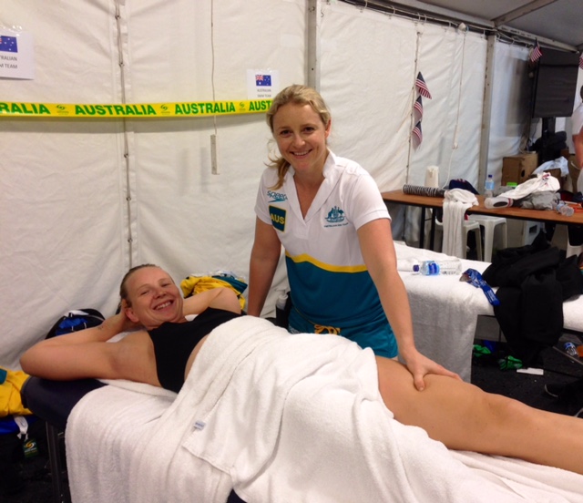 Thea massaging Melanie Wright at Pan Pacs 2014